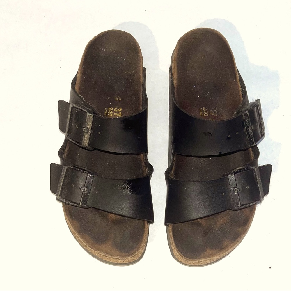 Very well loved black leather Birkenstocks